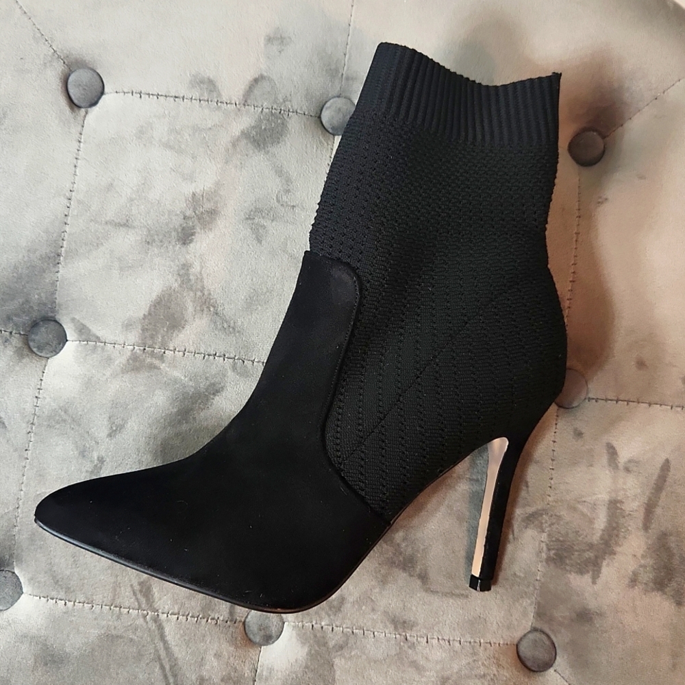 Women size 10M 4 inch heel boots